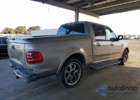 2001 Ford F150 Supercrew z USA, uszkodzony, nr VIN 1FTRW07L51KC49700